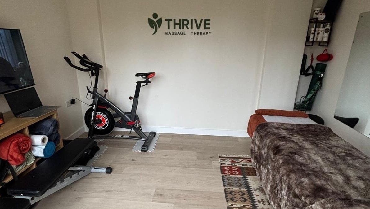 THRIVE Massage Therapy - QUORN offers a cozy space with a massage table and exercise bike in Quorn, England, GB.