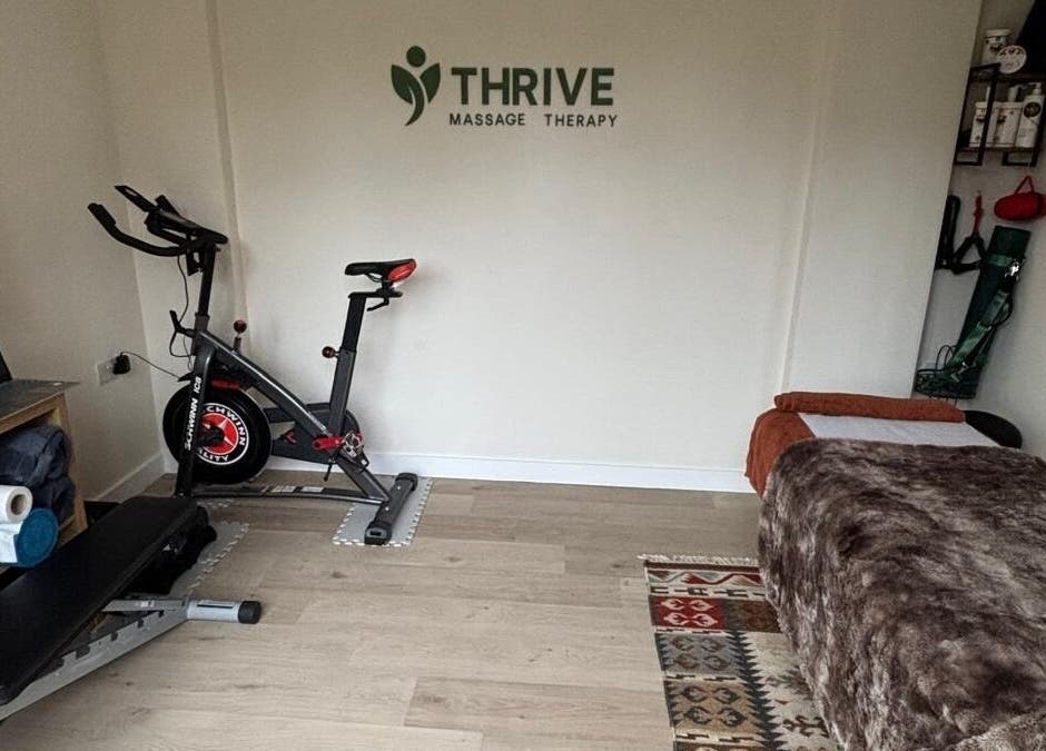 THRIVE Massage Therapy - QUORN offers a cozy space with a massage table and exercise bike in Quorn, England, GB.