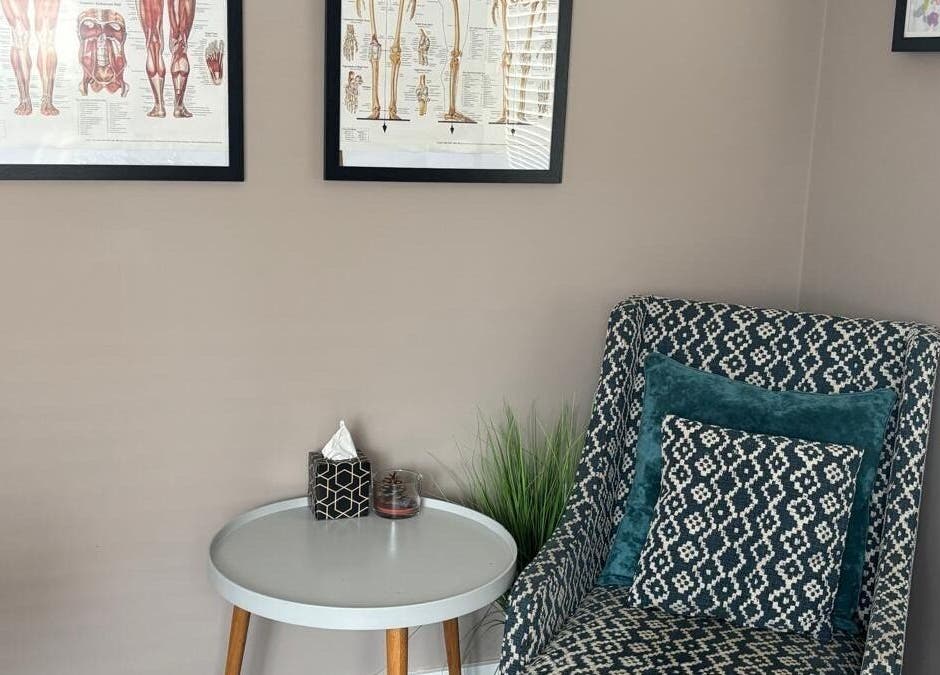 Inviting sitting area at THRIVE Massage Therapy - QUORN, Quorn, England, GB with stylish chair and artwork.