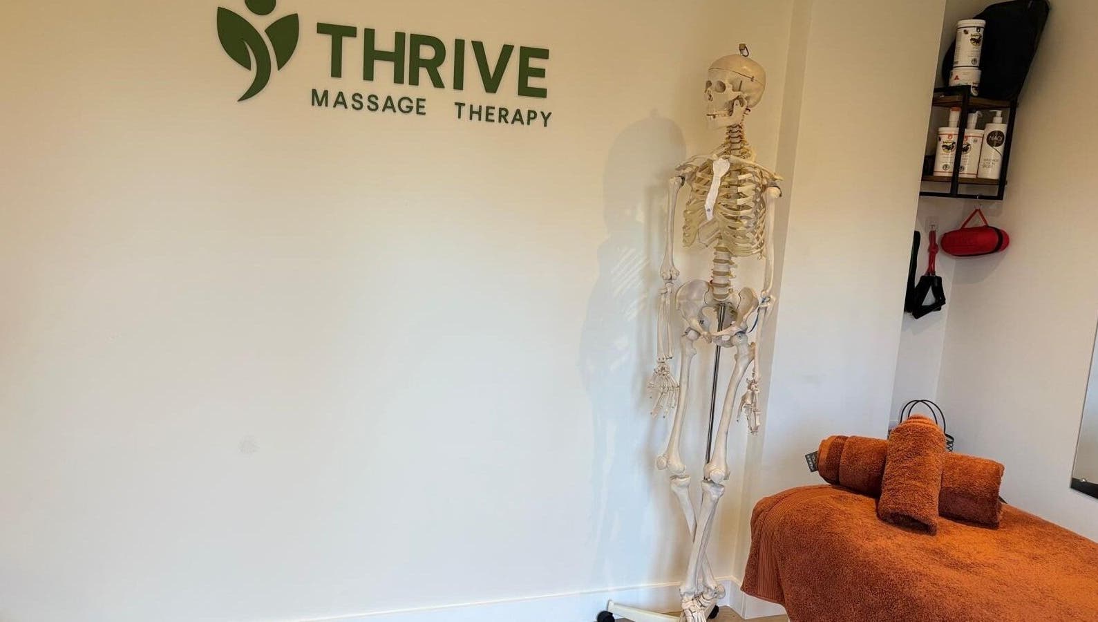 Tranquil therapy room at THRIVE Massage Therapy - QUORN, Quorn, England, GB featuring massage table and decor.