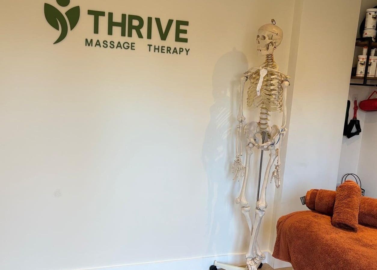 Interior of THRIVE Massage Therapy - QUORN with cozy treatment table, Quorn, England, GB.