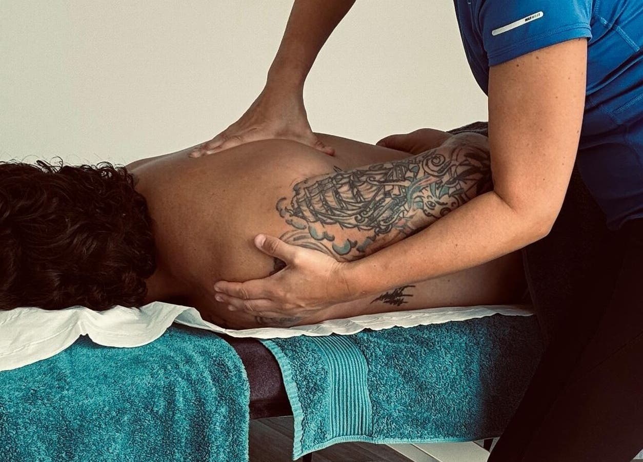 Therapist giving massage at THRIVE Massage Therapy - QUORN, Quorn, England, GB for ultimate relaxation.