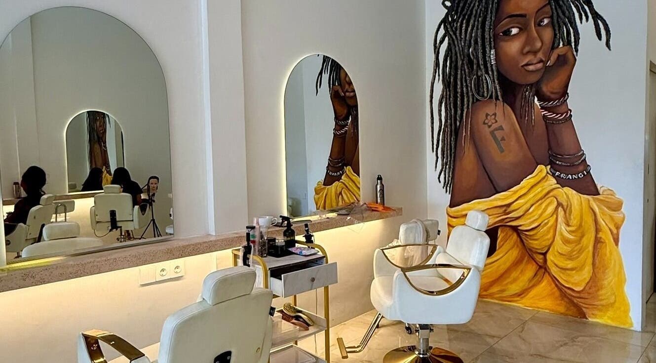 Frangi Braids Salon interior with vibrant mural and salon chairs, Bali, Bali, ID.