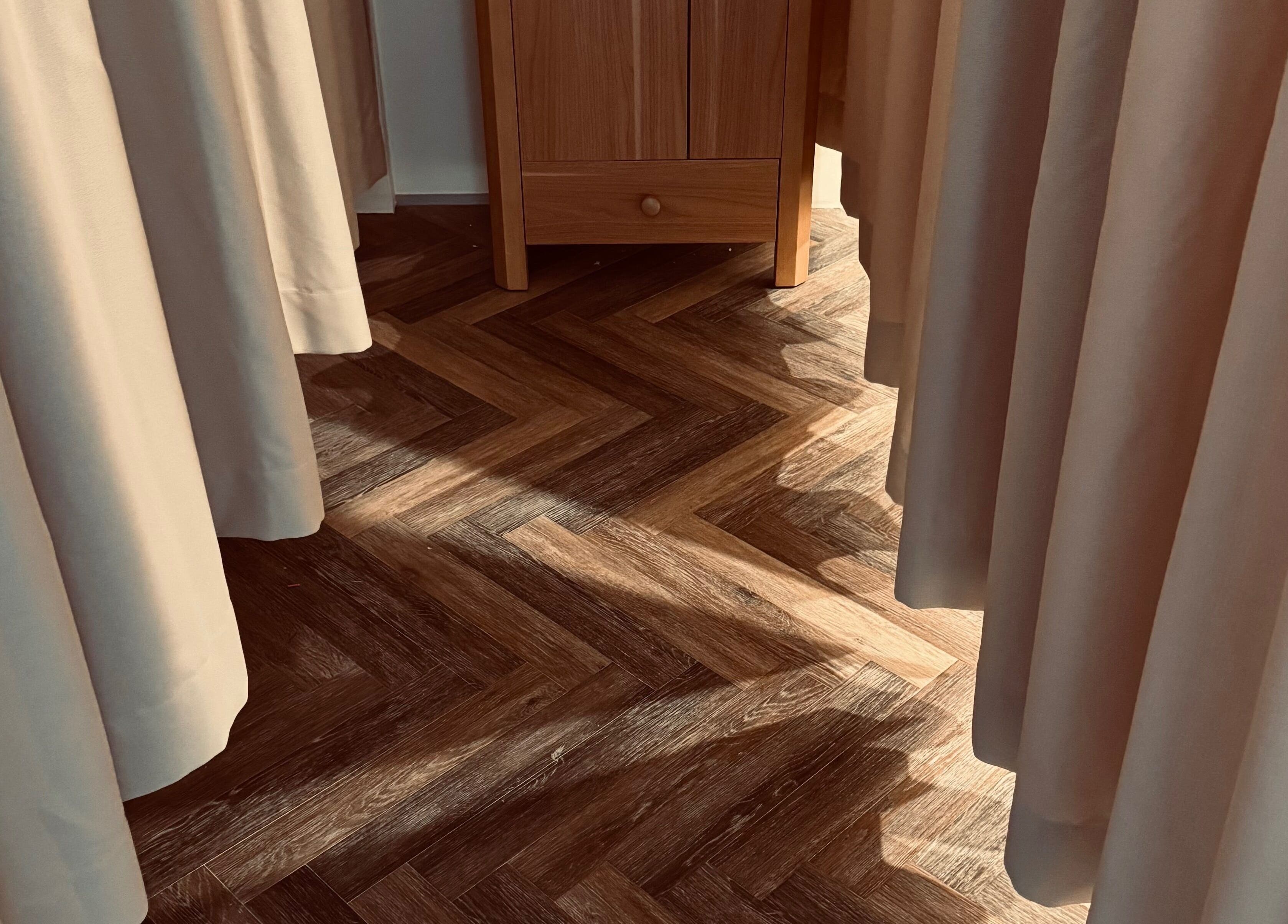 Elegant private space with wood flooring and soft curtains at Zenova Massage, Auckland, Auckland, NZ.