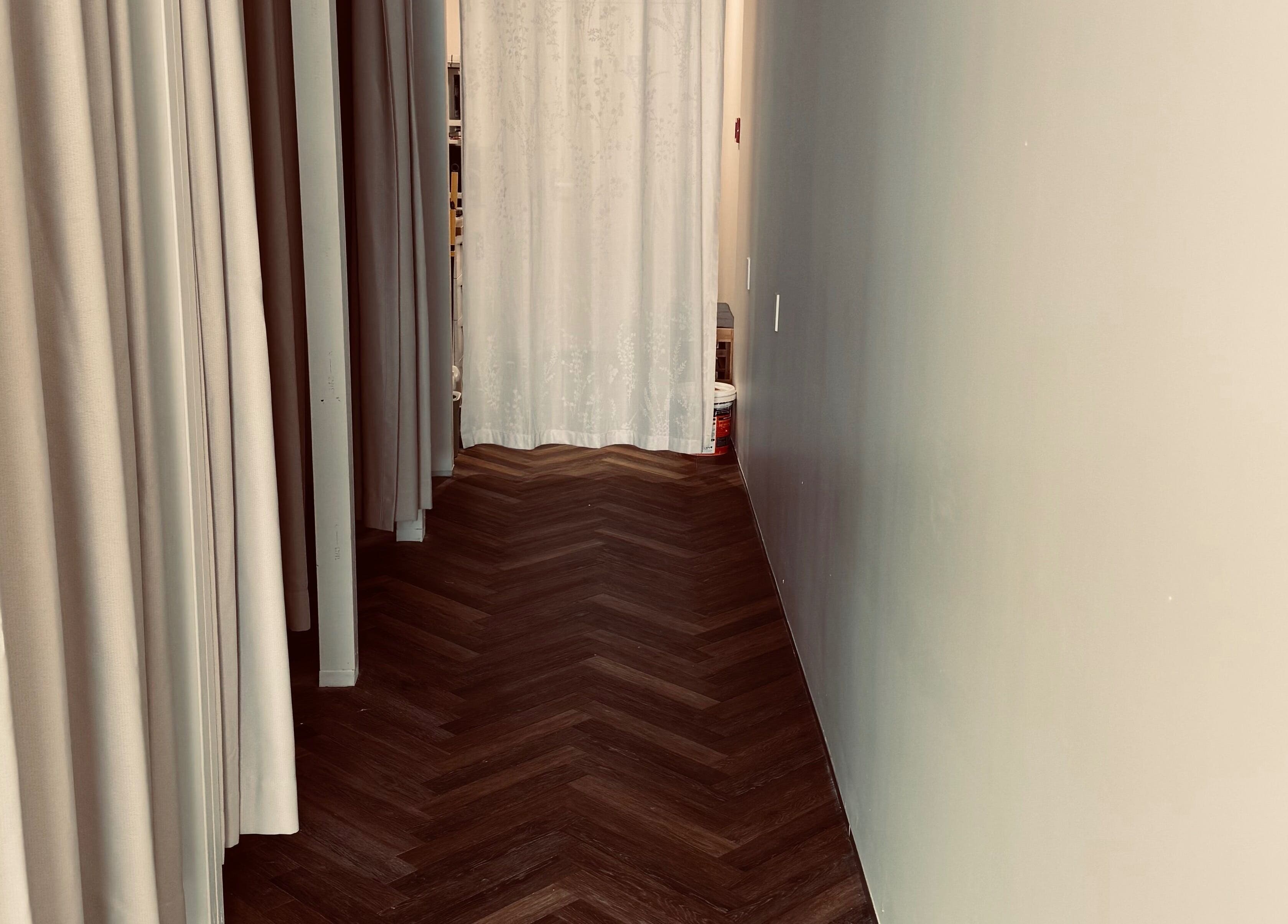Elegant hallway with soft curtains at Zenova Massage, Auckland, Auckland, NZ, amplifying tranquility.