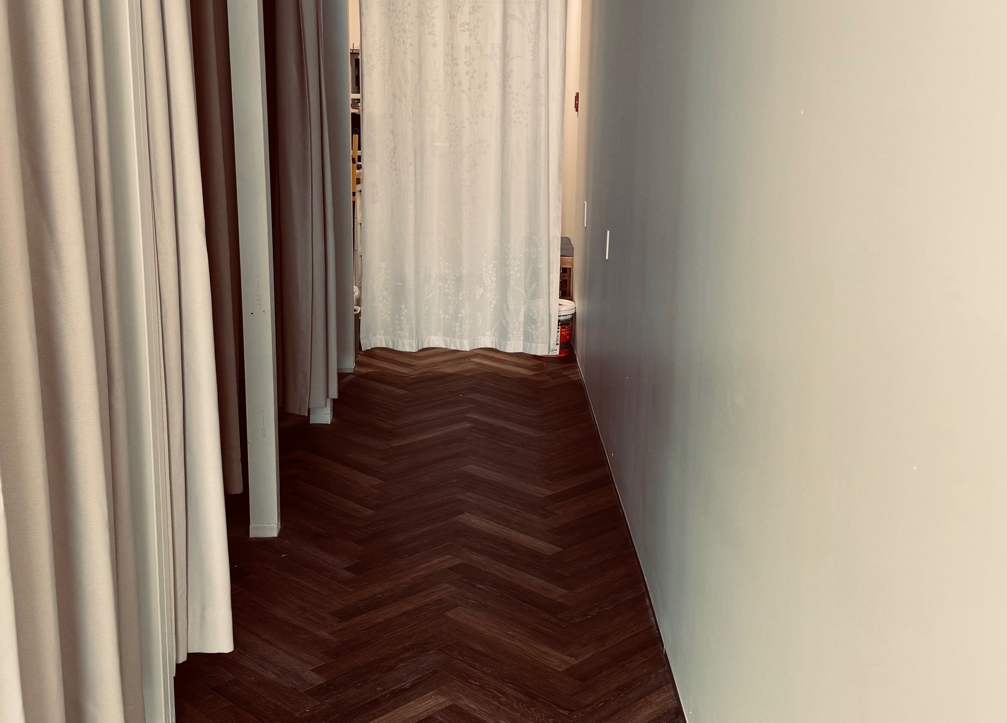 Zenova Massage hallway with elegant curtains in Auckland, Auckland, NZ offers a soothing ambiance.