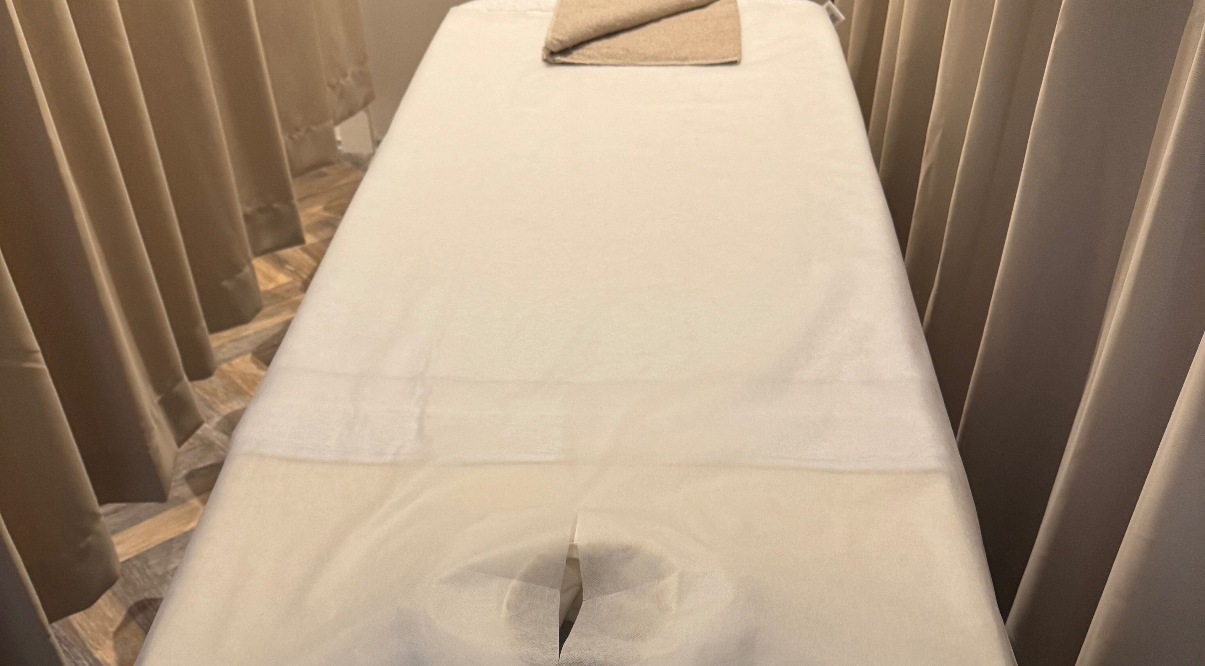Luxury massage table at Zenova Massage, Auckland, Auckland, NZ, exuding comfort and relaxation.