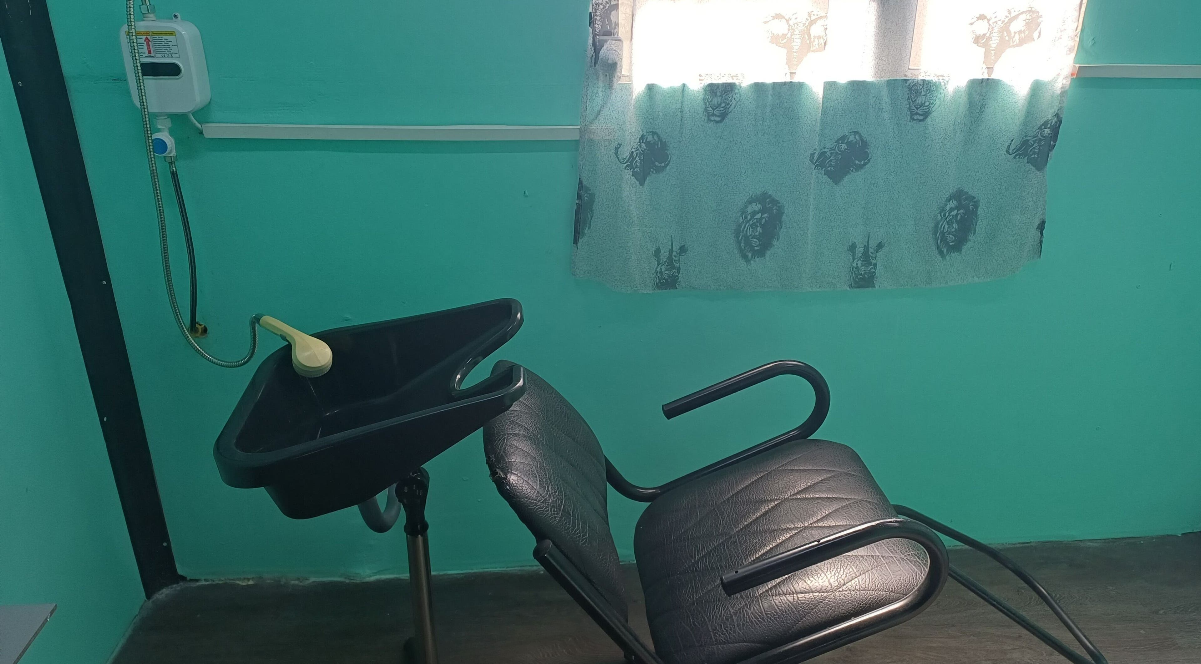 Hair washing station at M'Gee Studio in Cape Town, Western Cape, ZA, highlighting comfort and style.