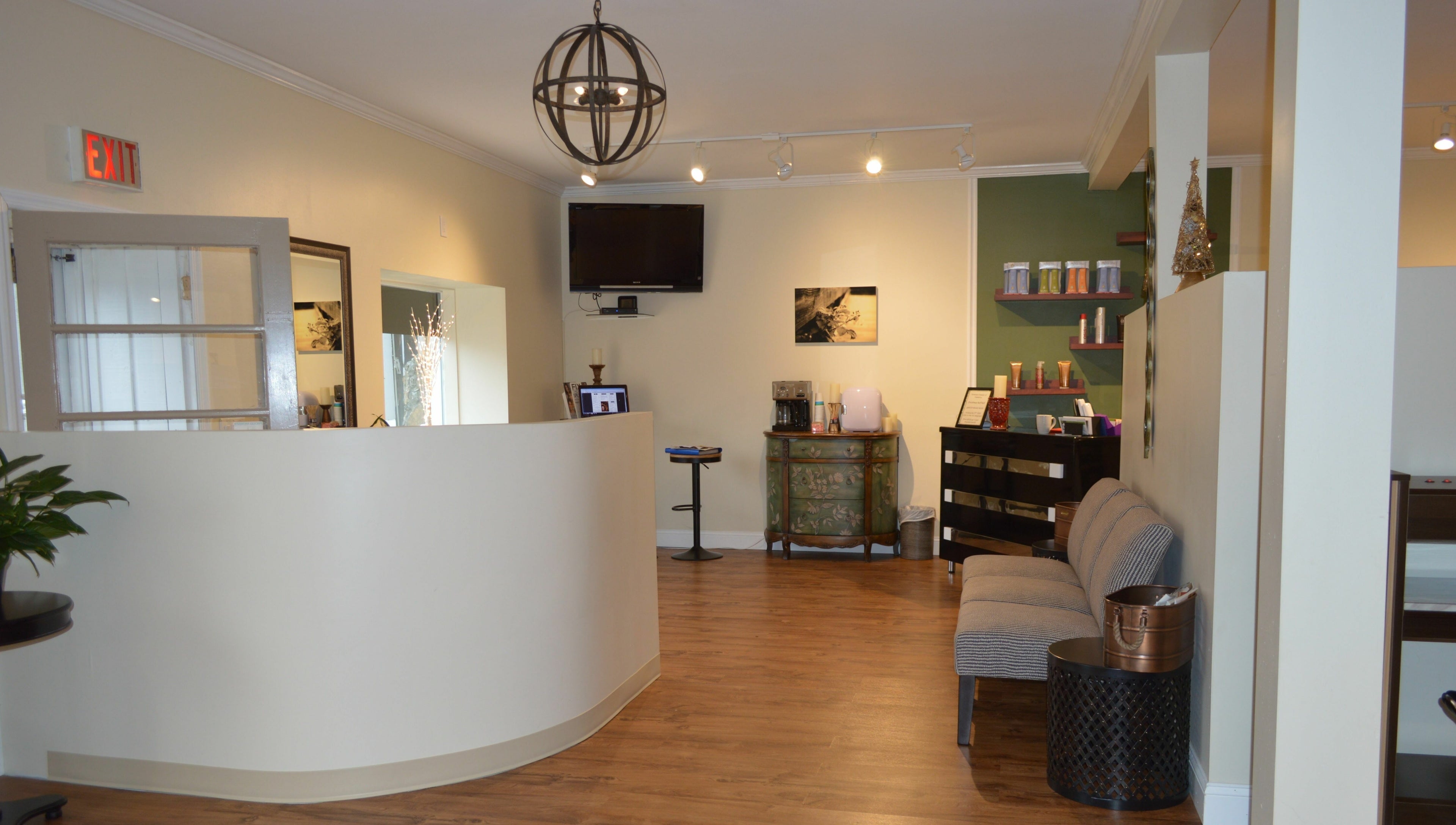 Welcoming and stylish reception area at Sizo Salon in Patterson, New York, US featuring modern decor.