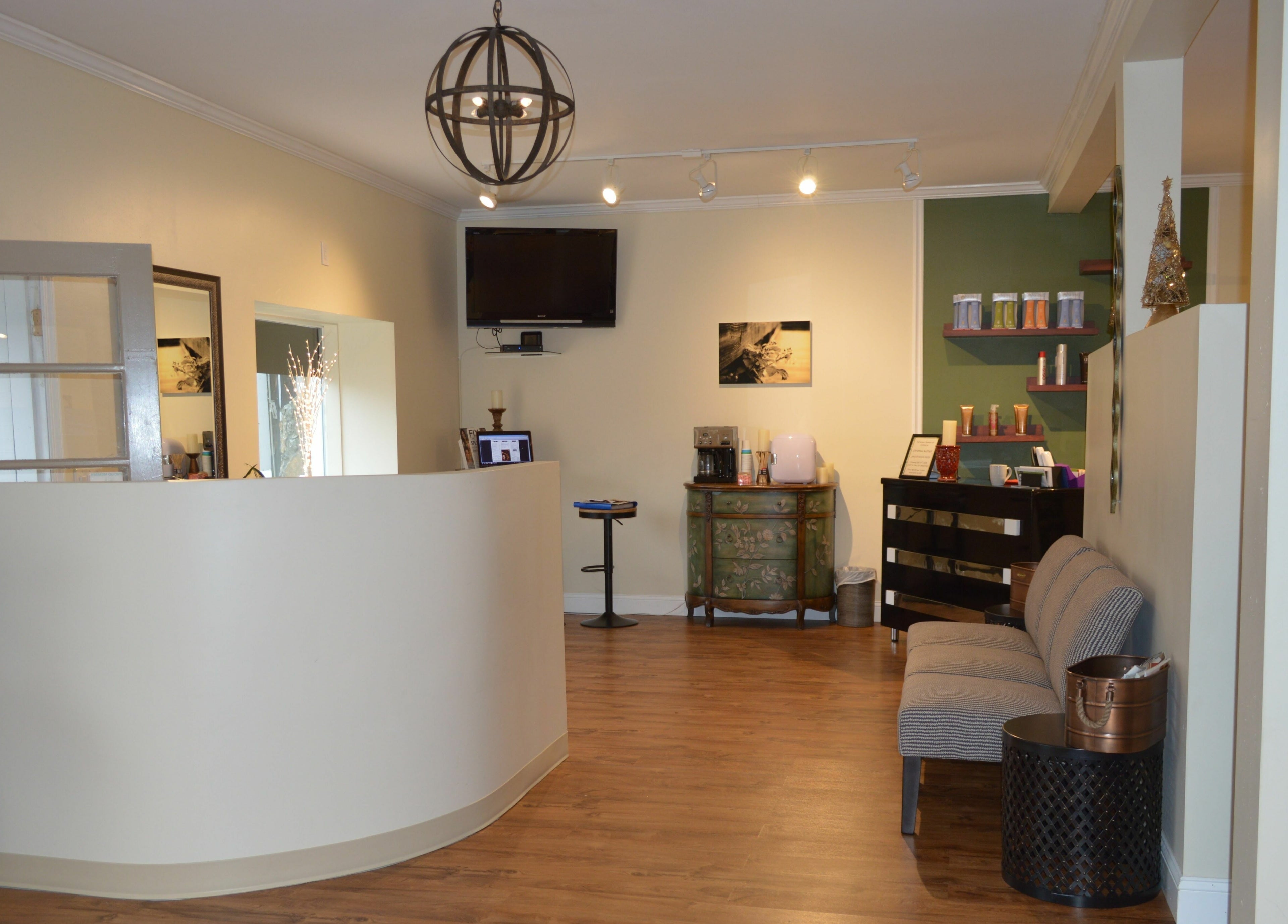 Welcoming and stylish reception area at Sizo Salon in Patterson, New York, US featuring modern decor.