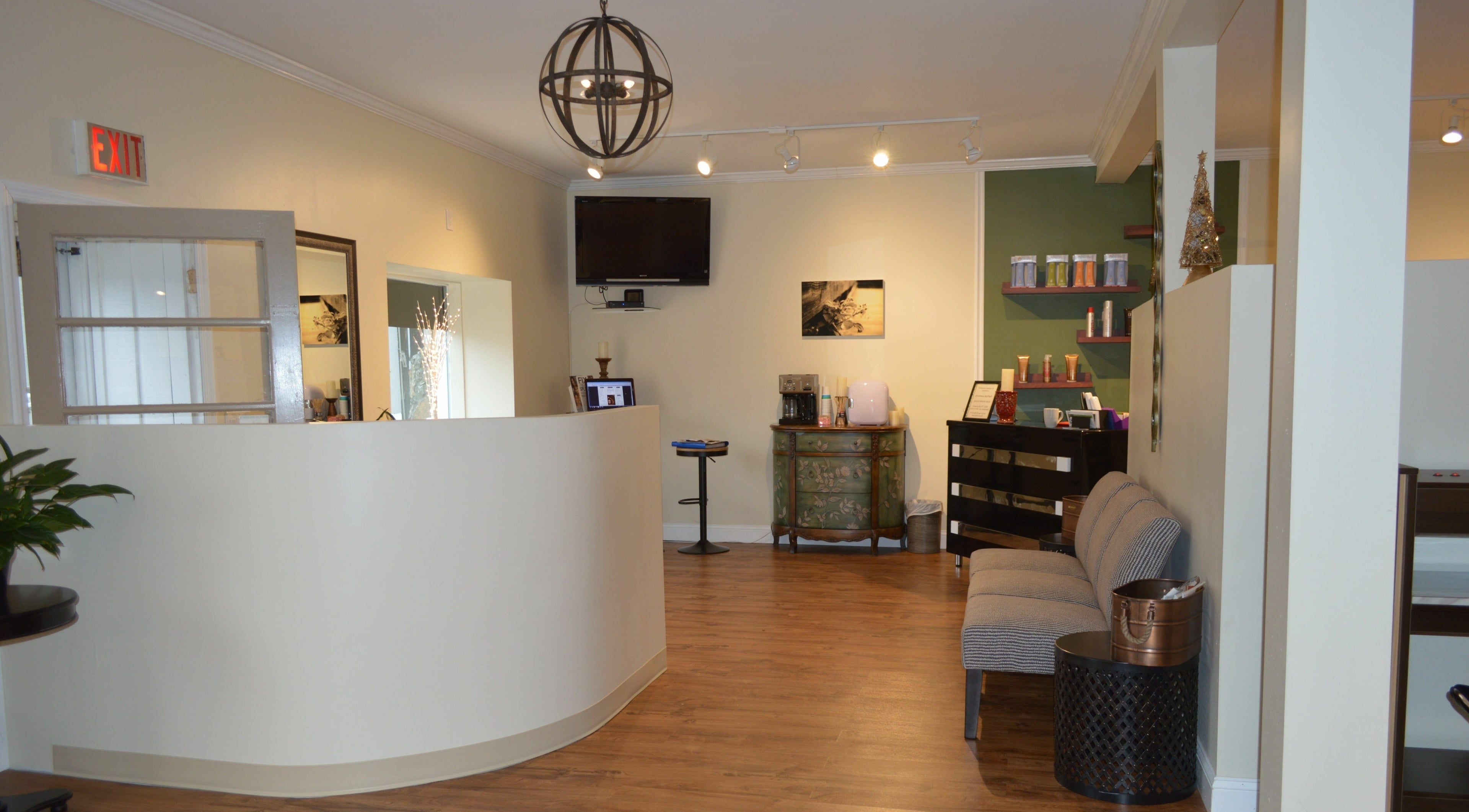 Welcoming and stylish reception area at Sizo Salon in Patterson, New York, US featuring modern decor.