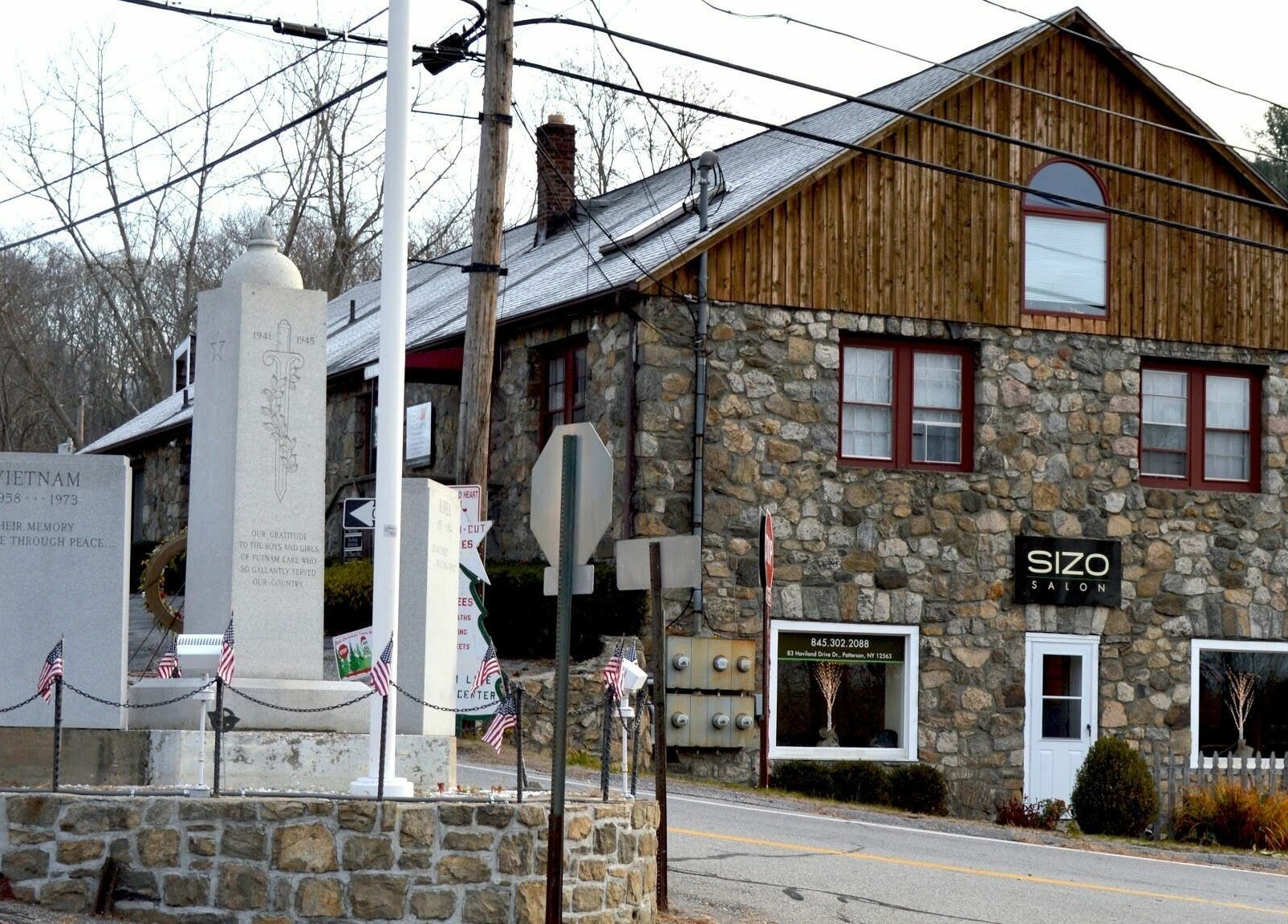 Sizo Salon in Patterson, New York with stone facade and cozy atmosphere, offering beauty and wellness services.