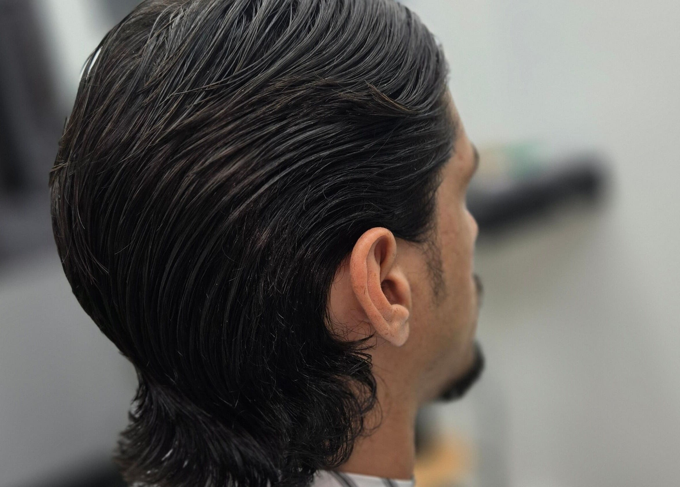 Sleek haircut at Midnight Barber Sydney, located in Bankstown, New South Wales, AU.