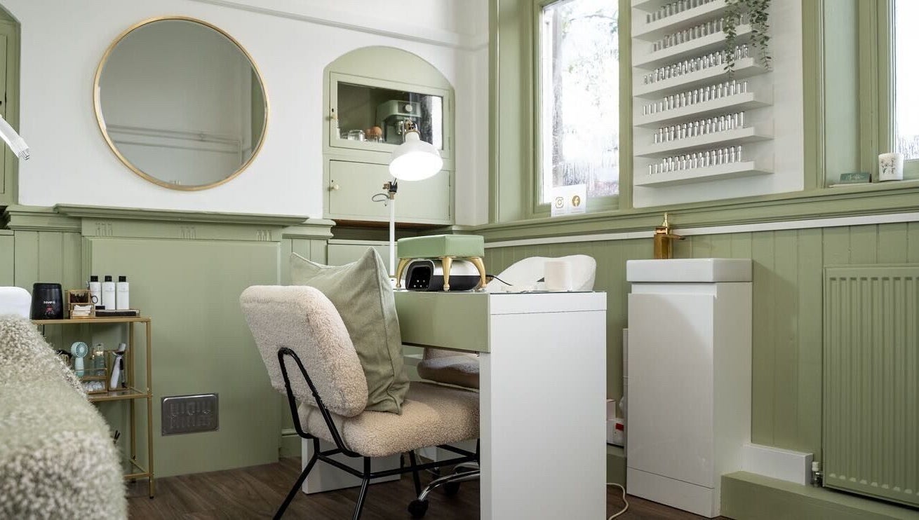 Chic interior of Beauty By Lexie Louise, Scarborough, GB with a stylish beauty station and plush seating.