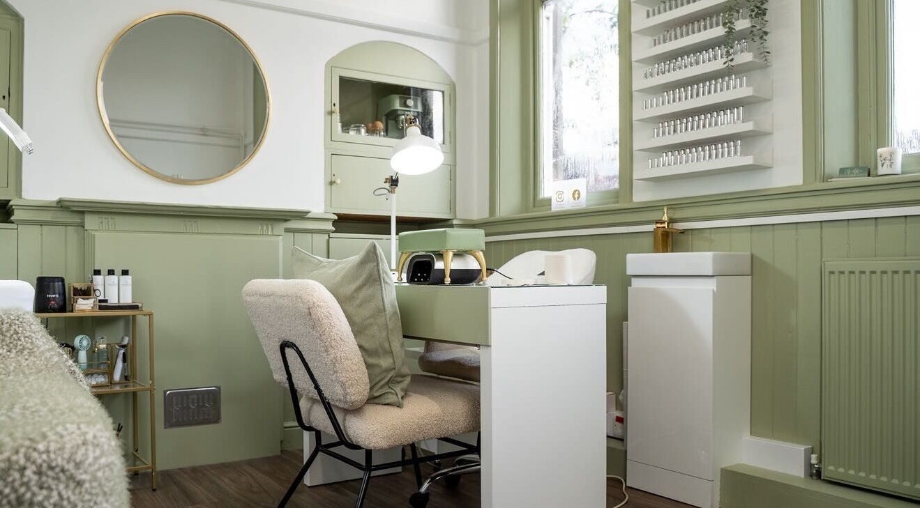 Chic interior of Beauty By Lexie Louise, Scarborough, GB with a stylish beauty station and plush seating.