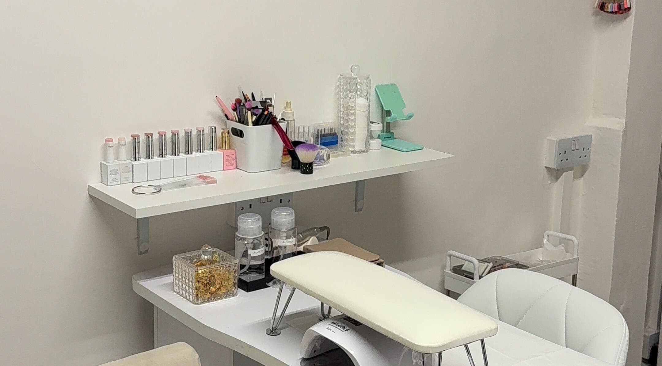 Nail care station at The Studio UK, Southend-on-sea, England, GB, featuring organized nail products and tools.