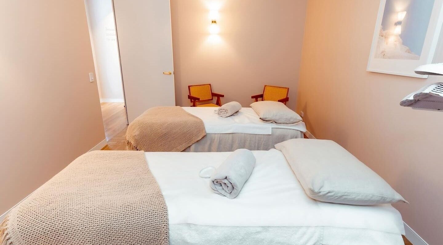 Tranquil massage room with twin beds at Atma Wellbeing, Dee Why, New South Wales, AU.