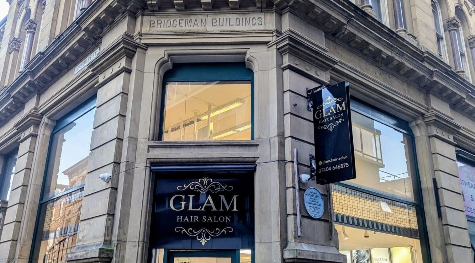 Front view of Glam Hair Salon, located in Bolton, England, GB in the Bridgeman Buildings.
