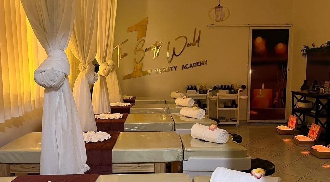 Serene interior of The 1 Beauty World, Canley Heights, New South Wales, AU. Cozy spa beds with soft lighting.