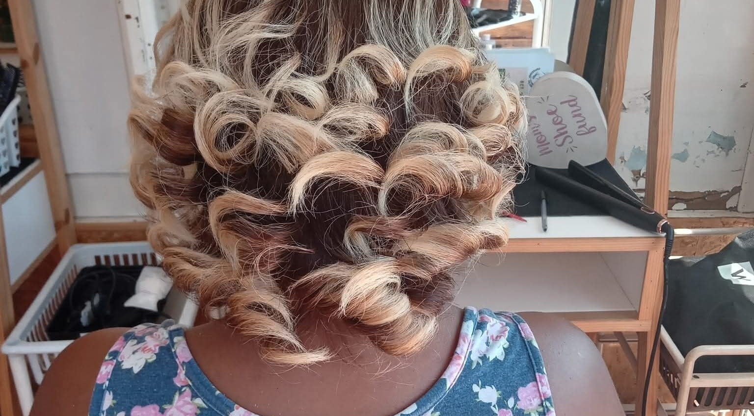 Elegant blonde curls styled at Antwaan Hair Studio 82 in Cape Town, Western Cape, ZA.