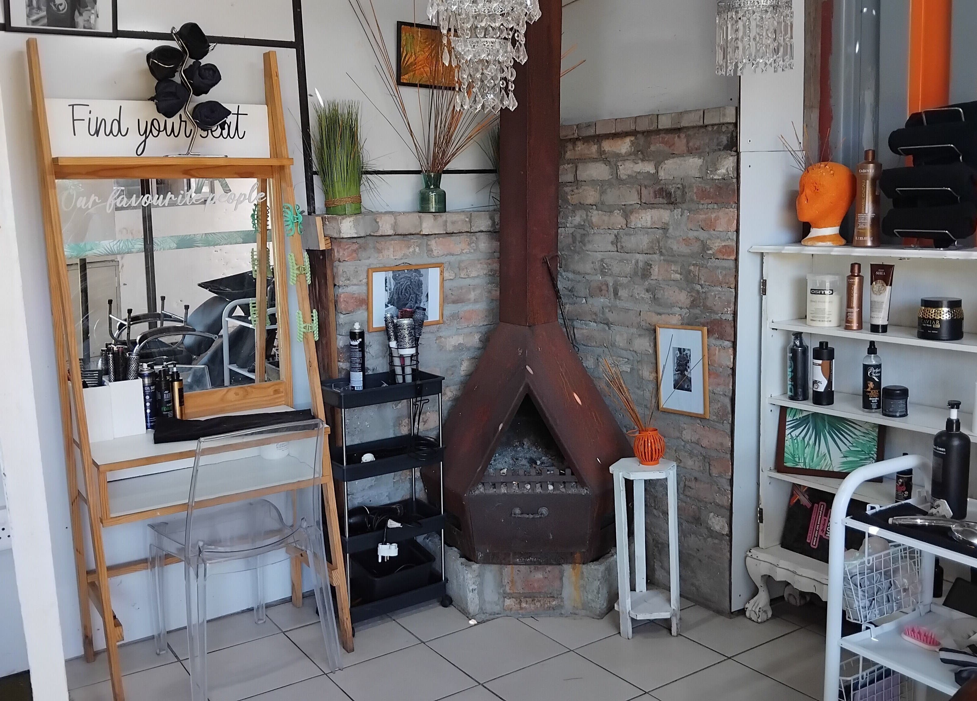 Cozy styling area with mirror at Antwaan Hair Studio 82, Cape Town, Western Cape, ZA.