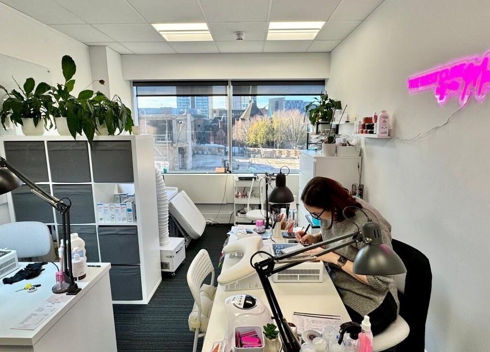 Inside Mango Beauty Studio in Woking, England, GB, featuring a bright setup with aesthetic decor.