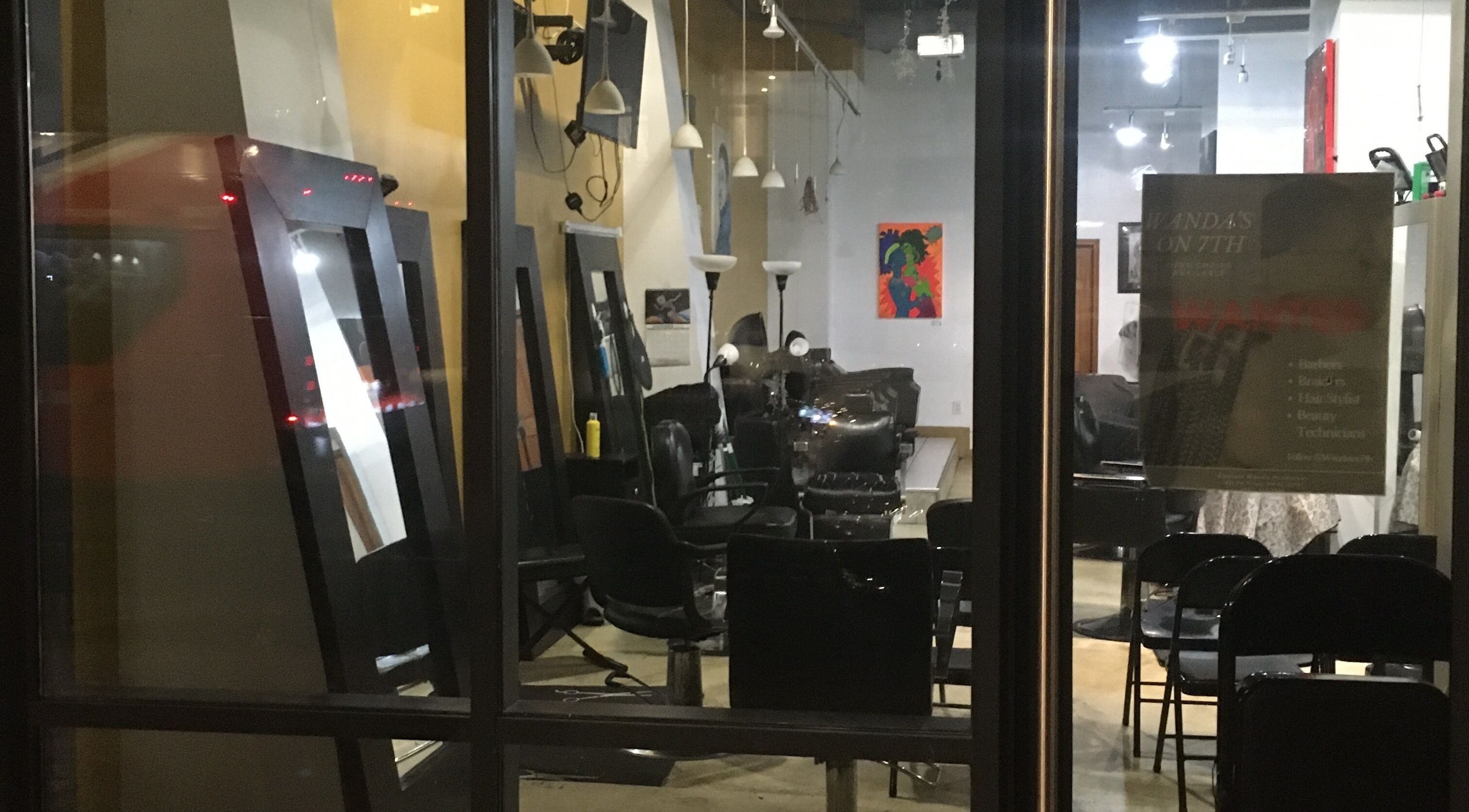 Interior view of Wanda’s on 7th salon in Washington, District Of Columbia, US through the window.