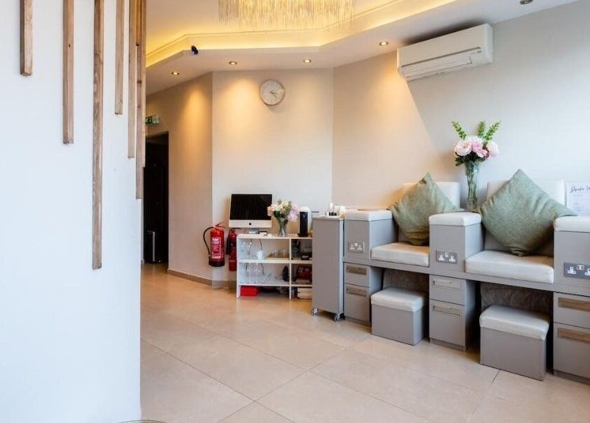 Interior of Enhance Angel Hair & Beauty, London, England, GB, showcasing stylish, serene seating and decor.