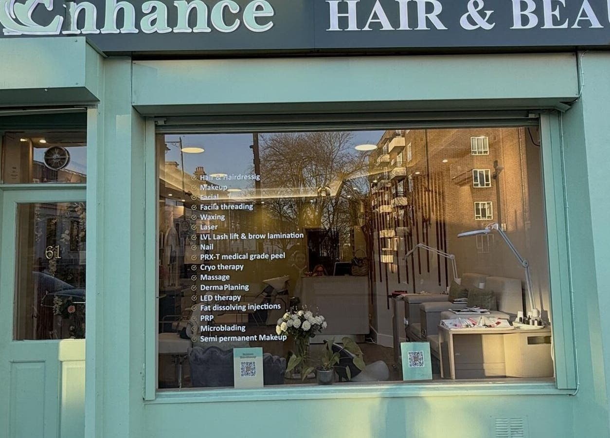 Exterior of Enhance Angel Hair & Beauty salon in London, England, GB showcasing services and inviting decor.