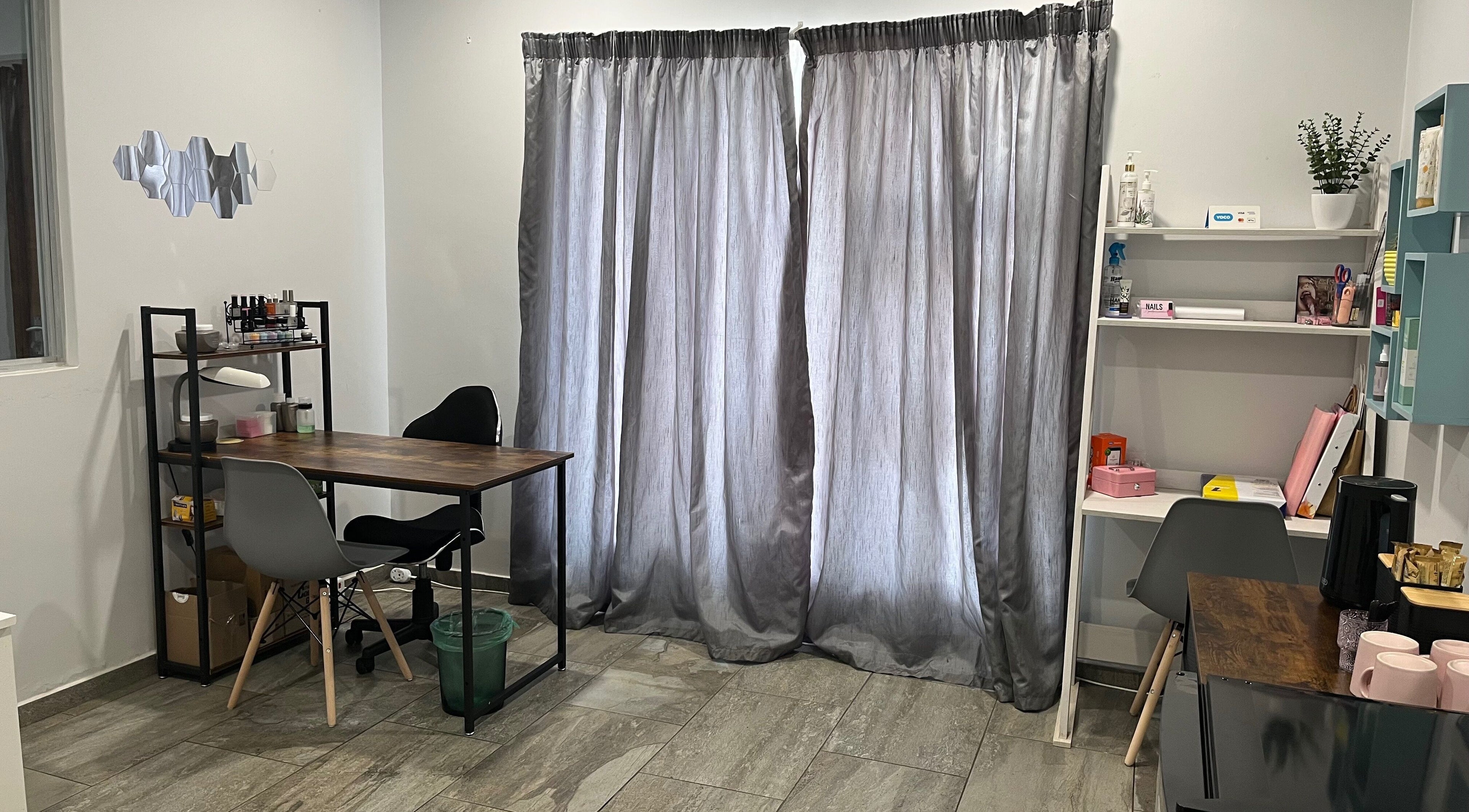 Calm and inviting nail salon corner at Lau Mel Beauty, Benoni, Gauteng, ZA with elegant decor and soothing ambiance.