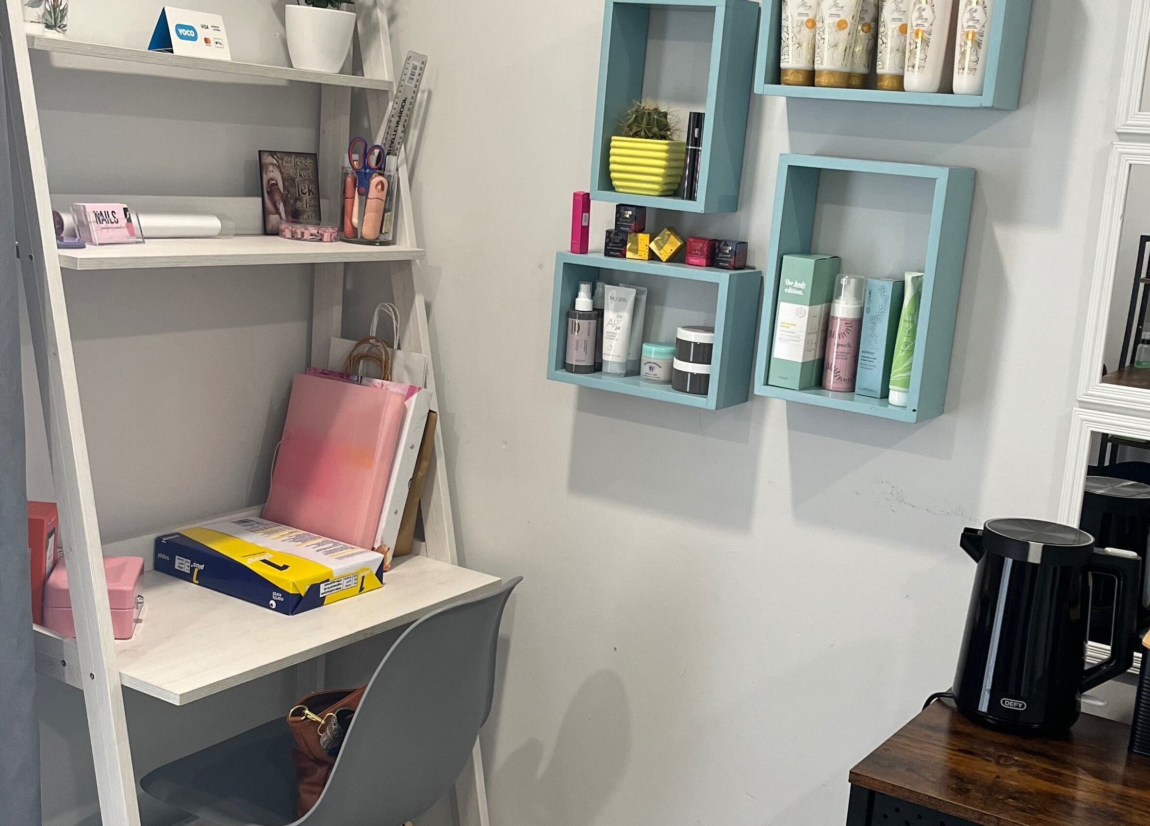 Stylish interior at Lau Mel Beauty, Benoni, Gauteng, ZA with beauty products and cozy setup.