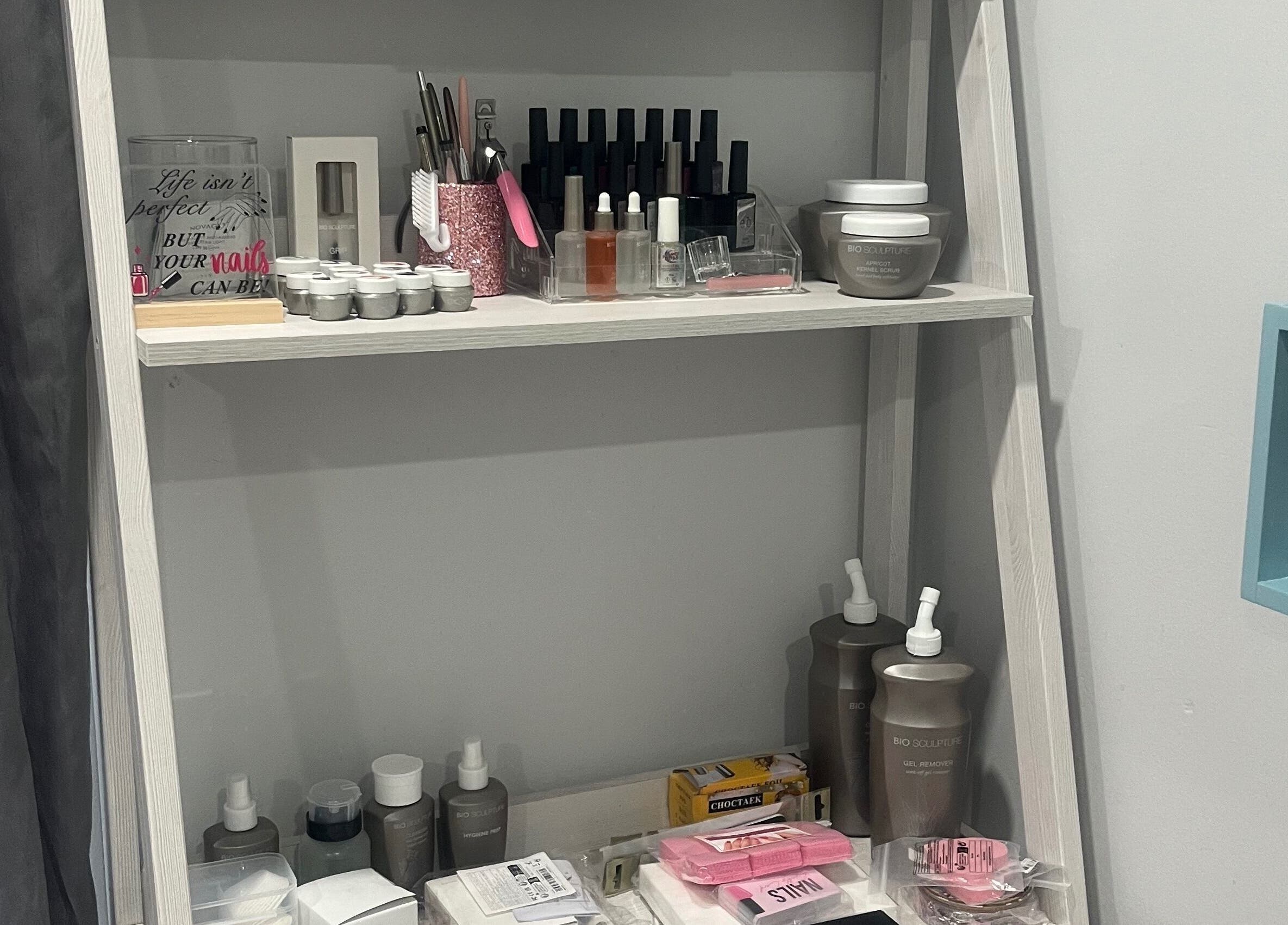 Nail care products neatly displayed on a shelf at Lau Mel Beauty, Benoni, Gauteng, ZA.