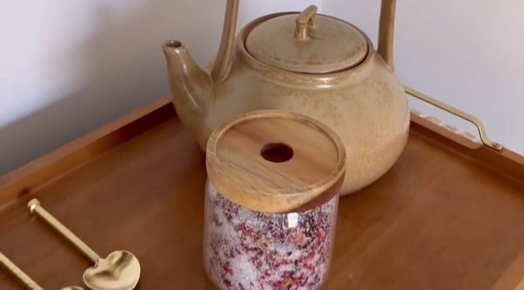 Elegant tea set and jar at Surya Skin + Wellness, Reigate, England, GB, evoke relaxation.