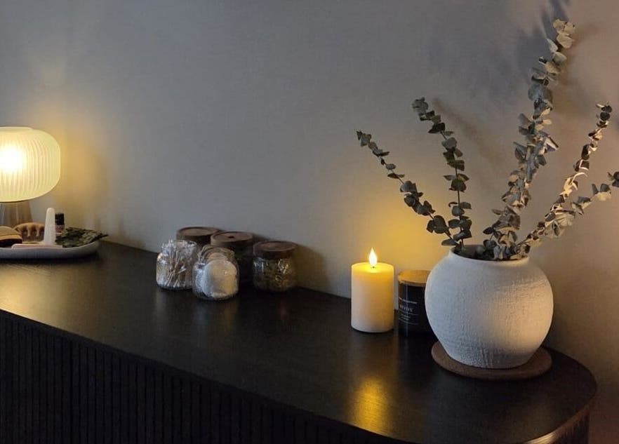 Serene ambiance at Surya Skin + Wellness, Reigate, England with soft lighting and elegant decor.