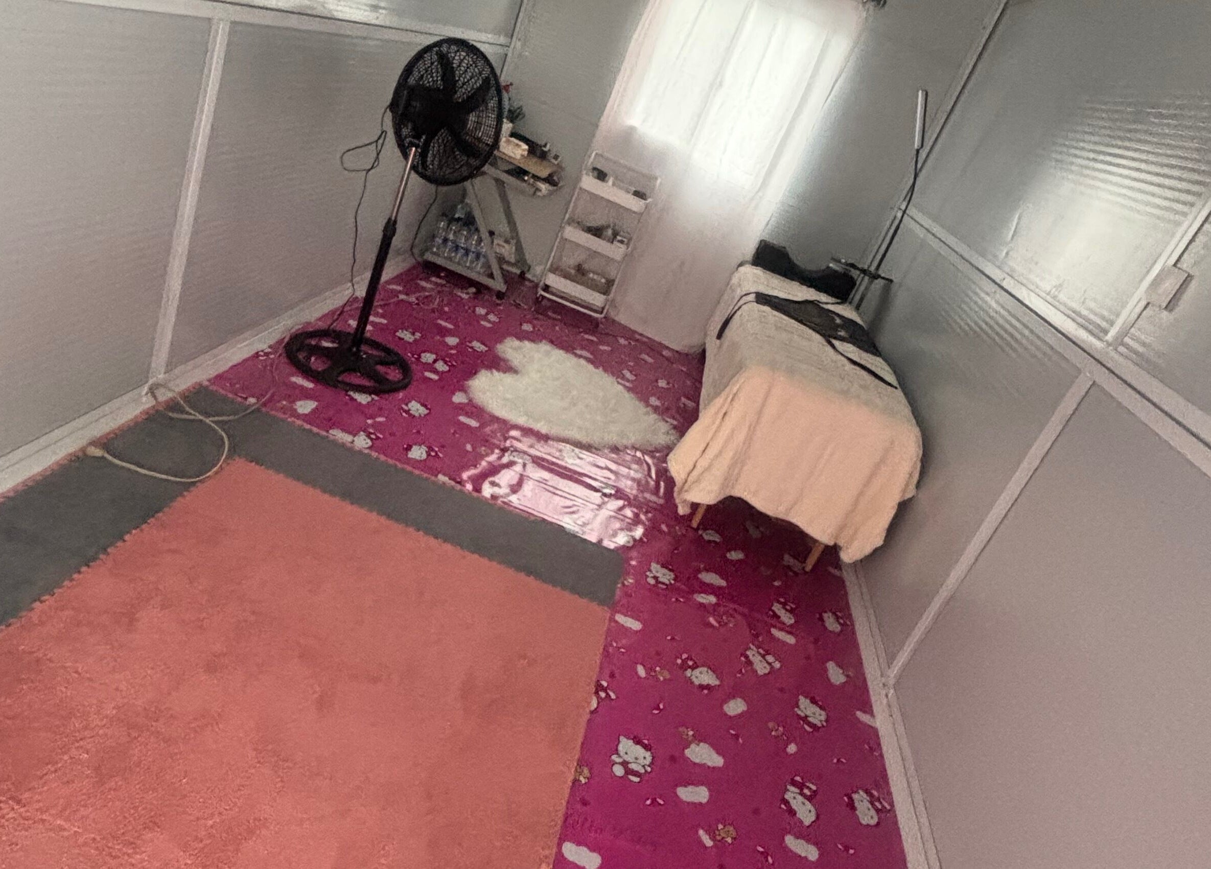 Serene treatment room at The Beauty Lab GY, Diamond, GY, featuring a bed and a calming ambiance.