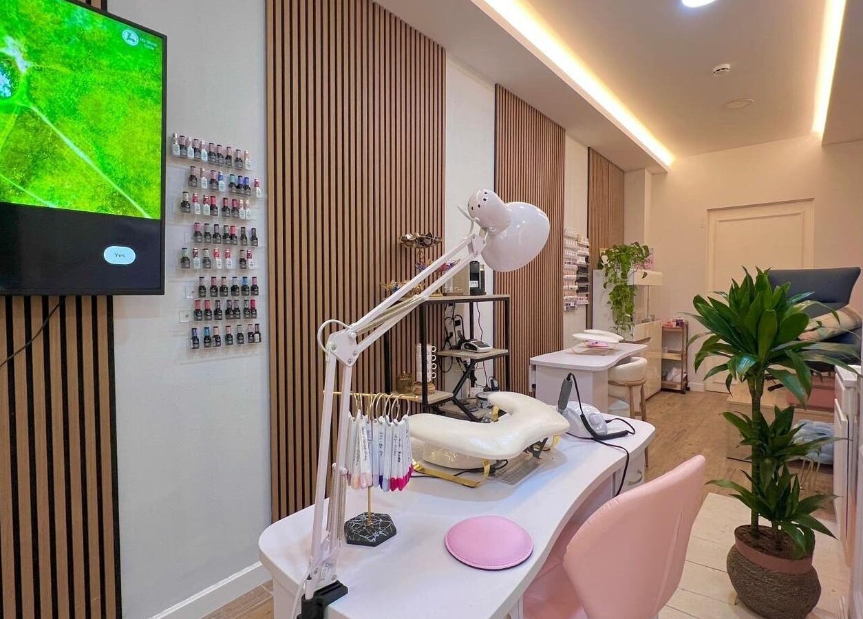 Stylish interior of Bluma Nail Bar, Tas-sliema, MT with nail polish display and modern decor.
