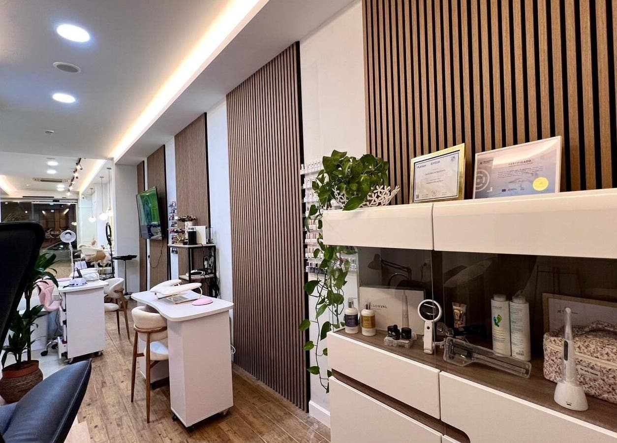 Elegant interior of Bluma Nail Bar in Tas-sliema, MT, showcasing stylish decor and manicure stations.