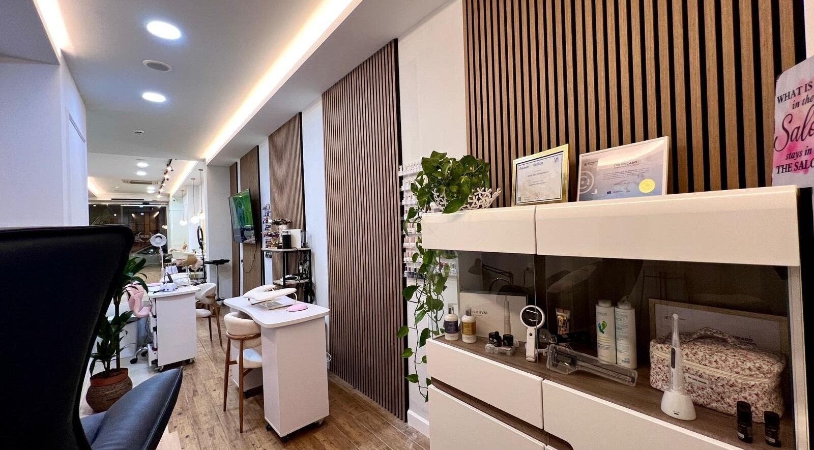 Elegant interior of Bluma Nail Bar in Tas-sliema, MT, showcasing stylish decor and manicure stations.