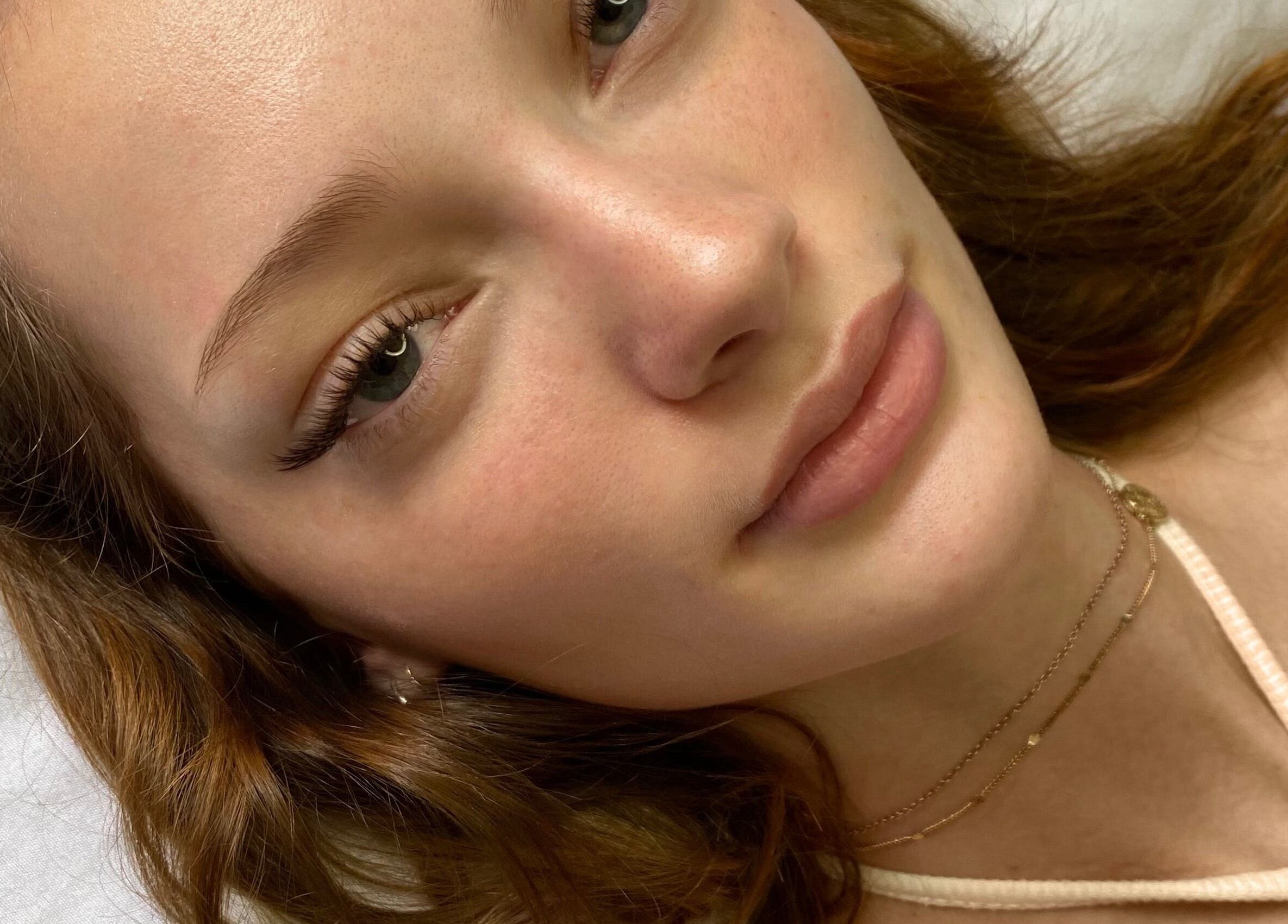 Close-up of a client's face post-treatment at House Of Alura, Midrand, Gauteng, ZA, showcasing smooth skin.