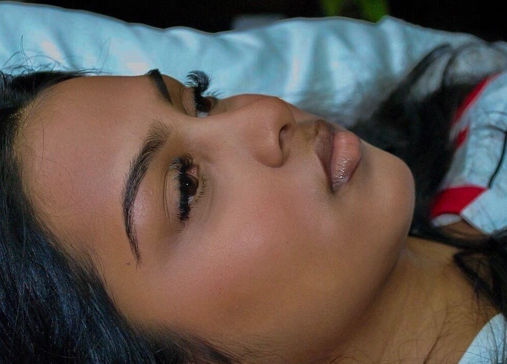 Serene woman relaxing at House Of Alura, Midrand, Gauteng, ZA, enhancing natural wellness and beauty.