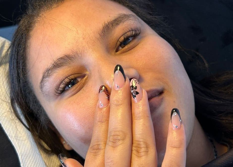 Woman showcasing stylish nails at MA Lash & Nail Studio, Cape Town, Western Cape, ZA.