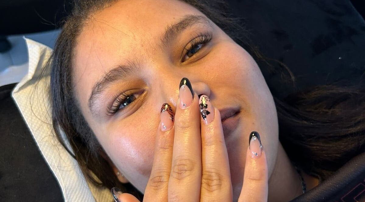 Woman showcasing stylish nails at MA Lash & Nail Studio, Cape Town, Western Cape, ZA.