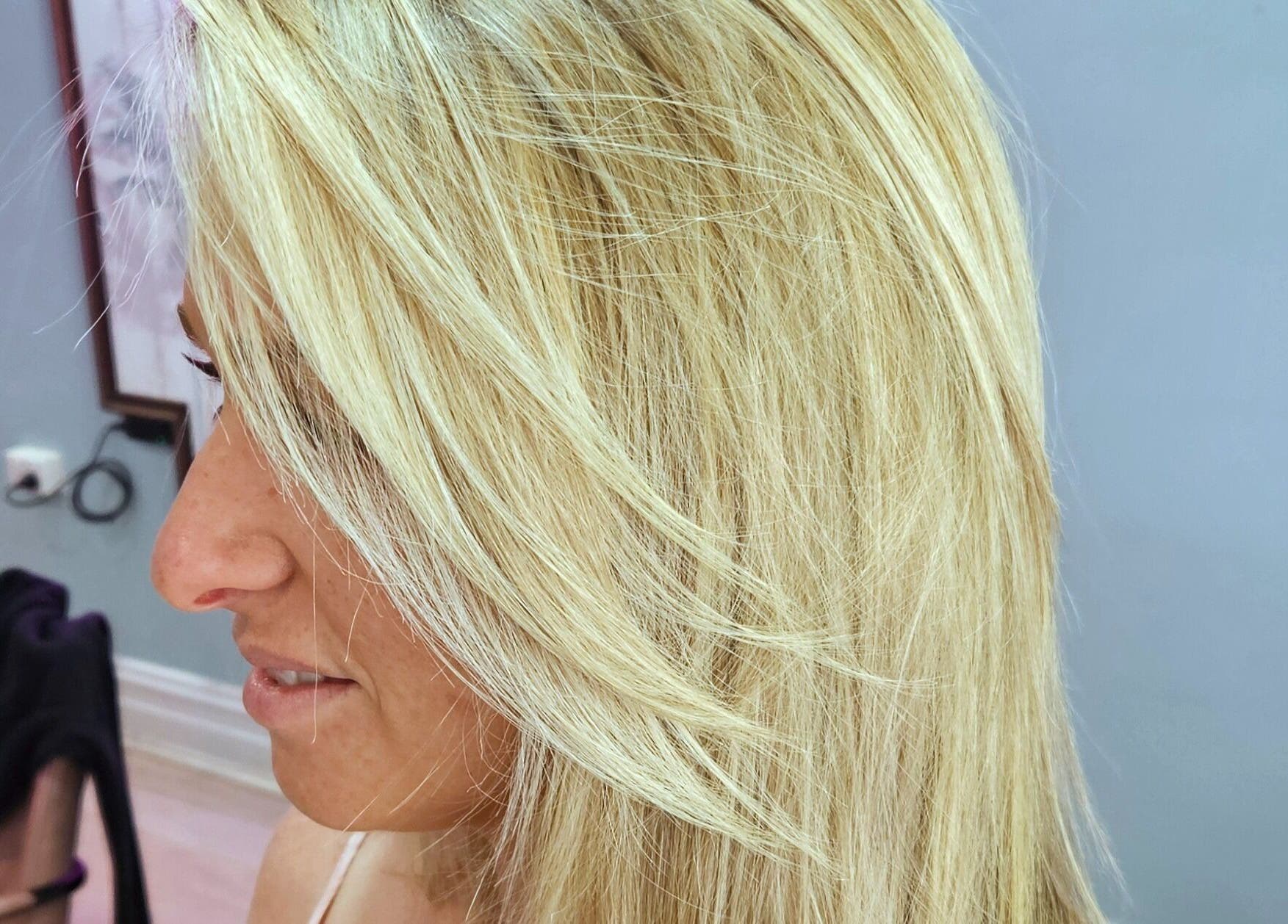 Blonde hair styled at Movement not just hair in Surry Hills, New South Wales, AU, showcasing modern salon work.