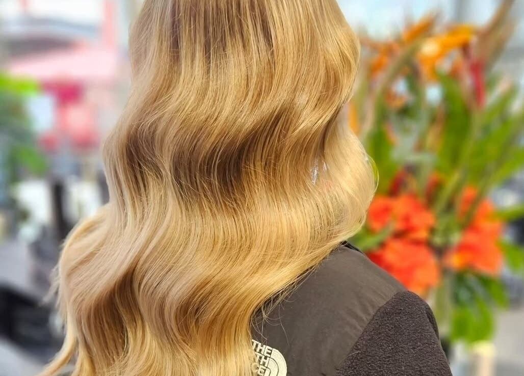 Blonde hair with soft waves at Movement not just hair, Surry Hills, New South Wales, AU.