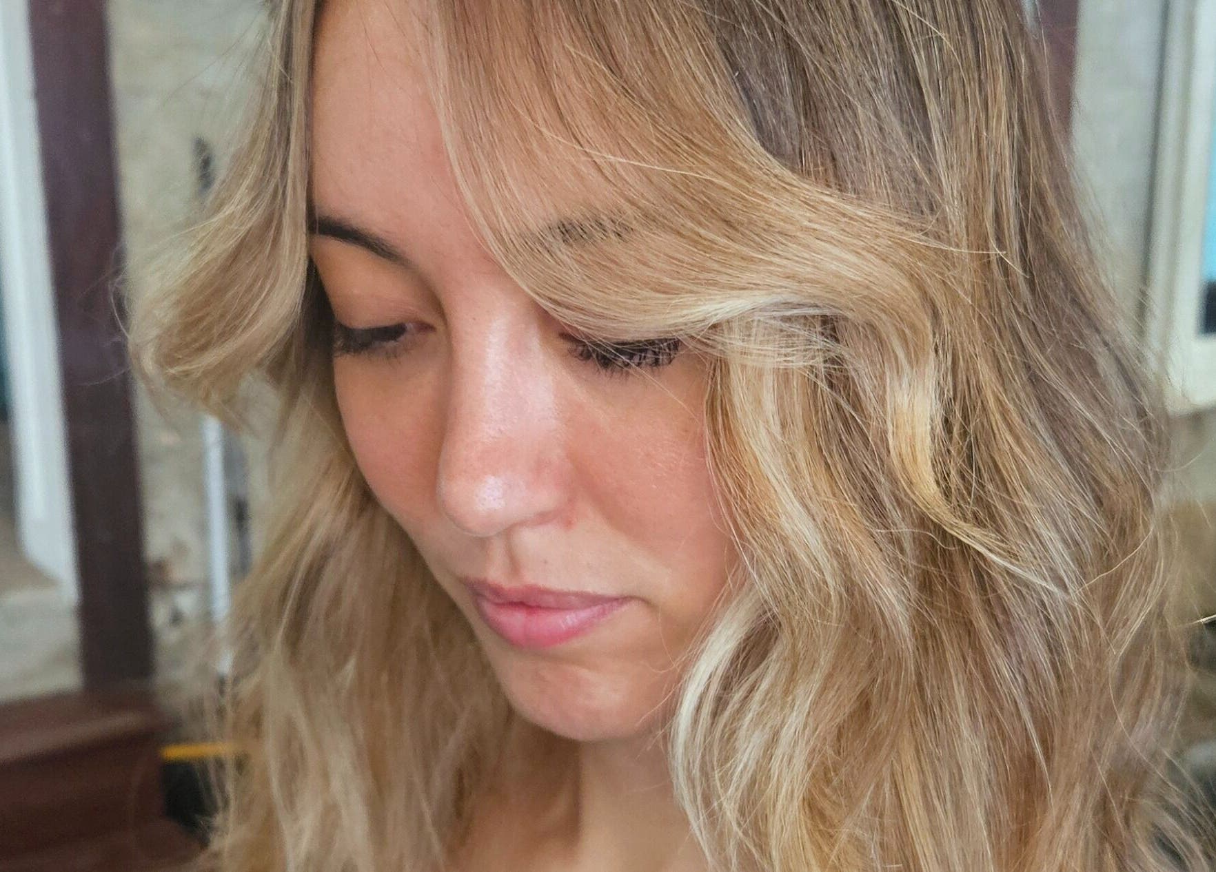 Blonde hair with soft curls at Movement Not Just Hair, Surry Hills, New South Wales, AU.