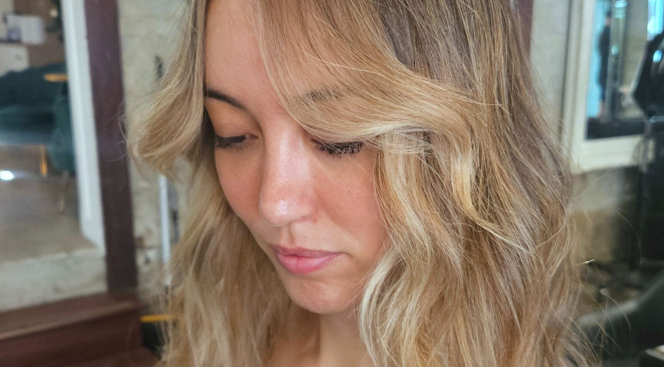 Blonde hair with soft curls at Movement Not Just Hair, Surry Hills, New South Wales, AU.