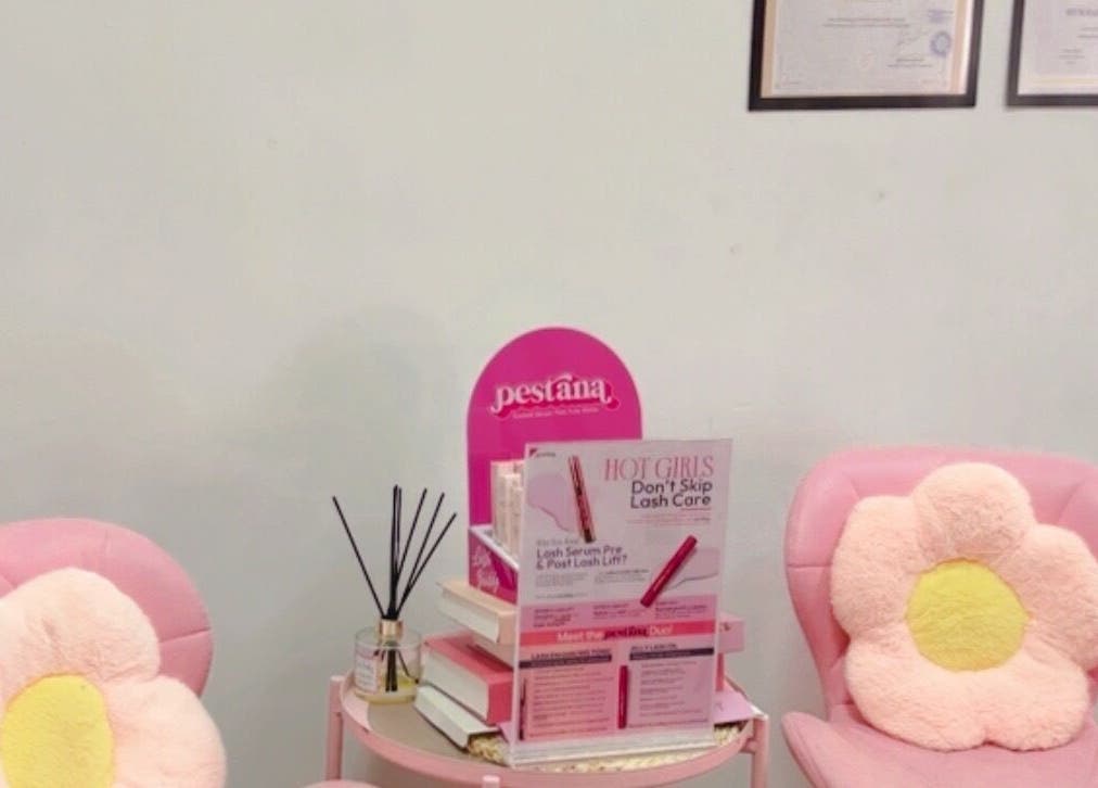 Cozy pink chairs with floral cushions at Ruang Spa Azren, Kuala Lumpur, Wilayah Persekutuan Kuala Lumpur, MY.