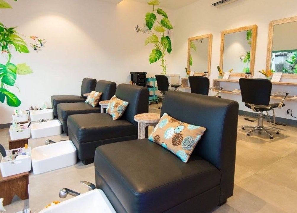 Relaxing pedicure station at Aliya Wellness Spa, Bali, Bali, ID with cozy chairs and vibrant decor.