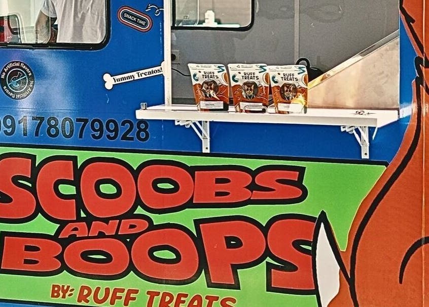 Scoobs And Boops Mobile Pet Grooming van showcasing pet treats, Parañaque, Metro Manila, PH.