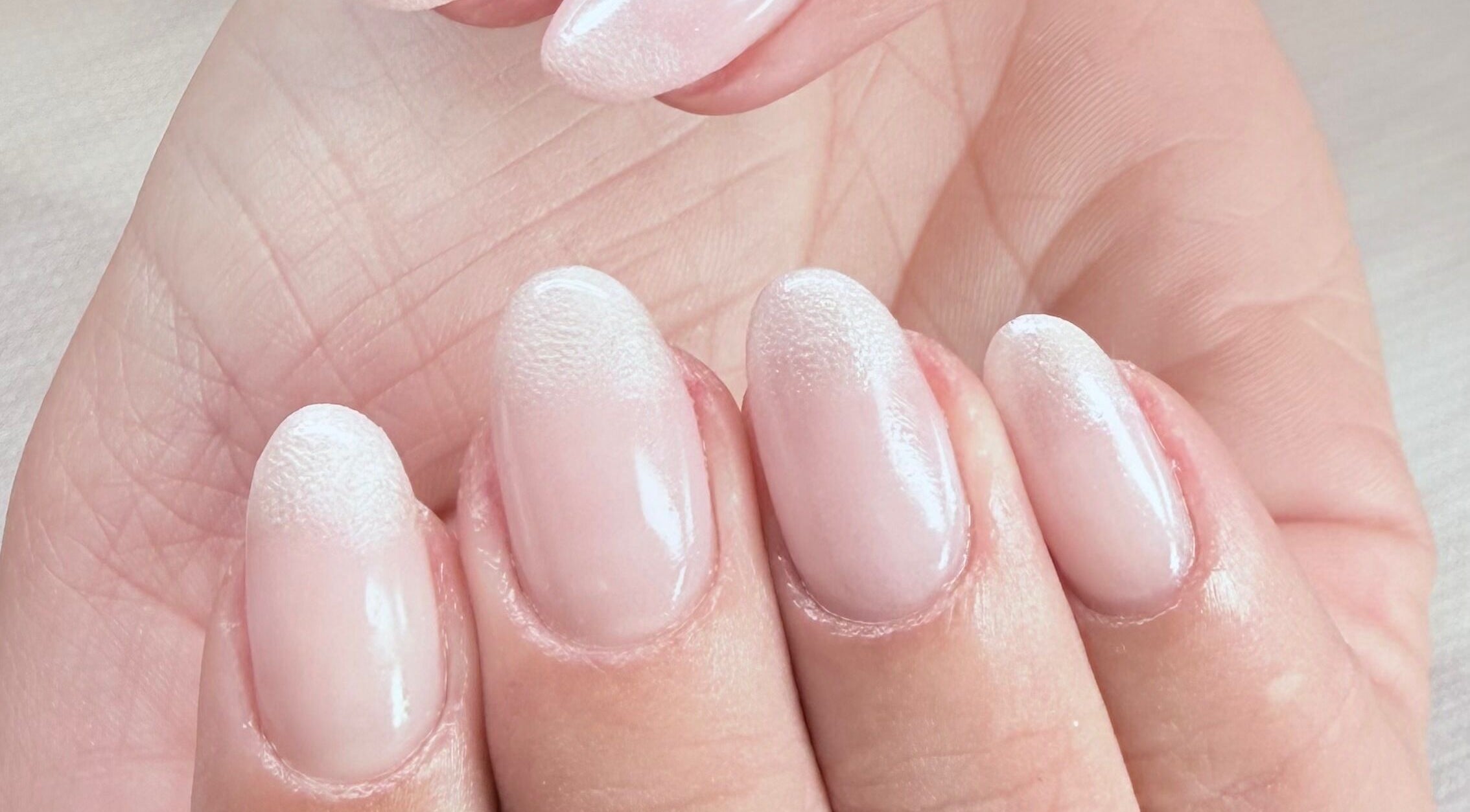 Close-up of elegant nude gel nails at Prontinha Beauty, Dublin, County Dublin, IE.